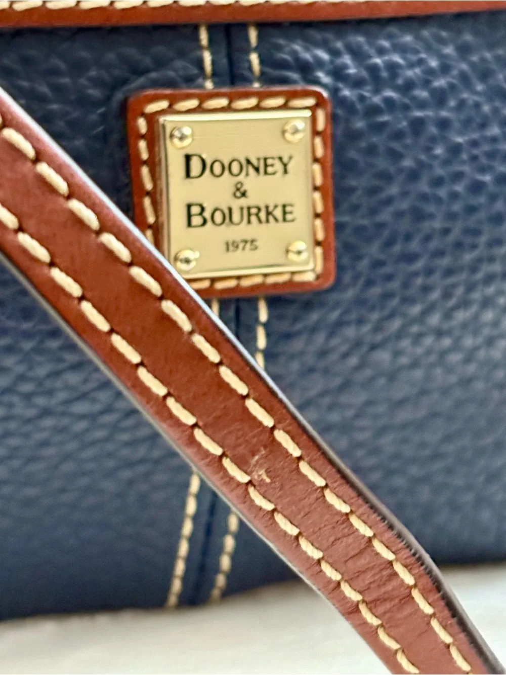 Dooney & Bourke Large Slim Cell Phone Wristlet – Navy Blue Pebble Grain Leather.